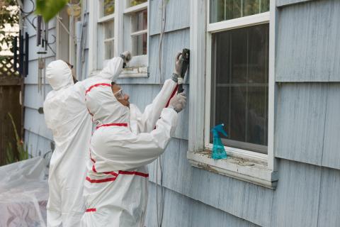 adults hazmat suits lead paint